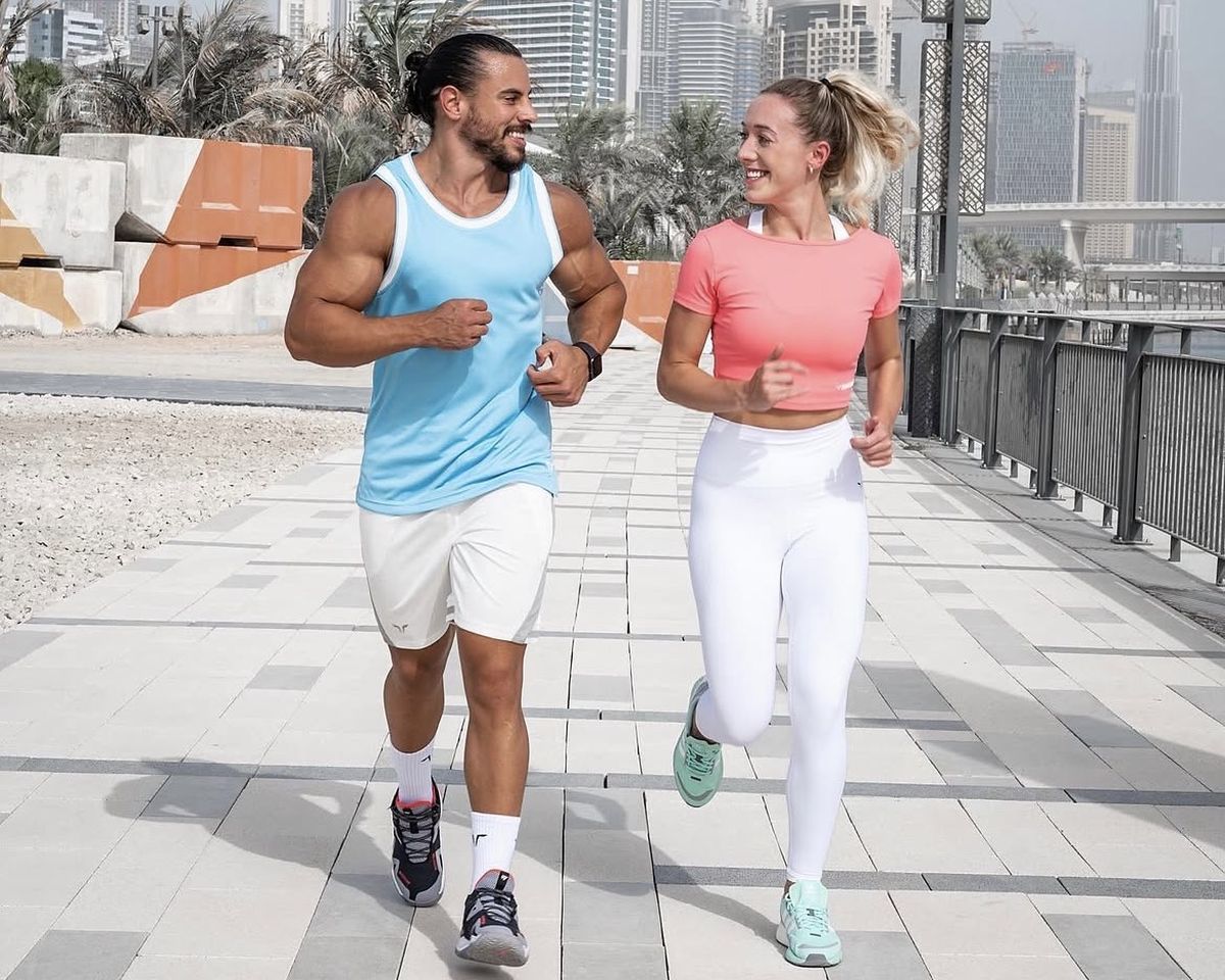 Chloe Antoniazzi and Tarek Elzamek running together in Dubai