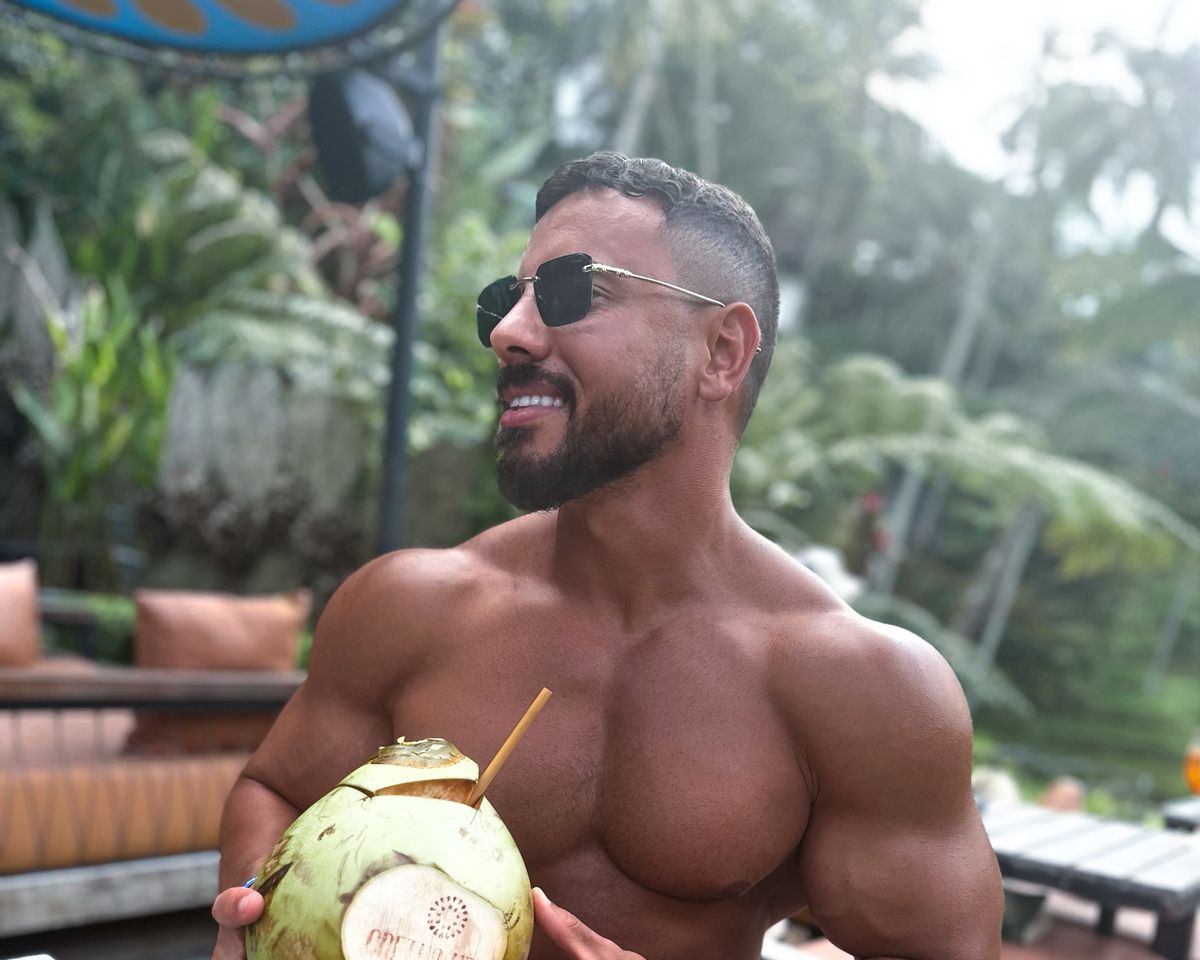 Tarek Elzamek, Dubai personal trainer, enjoying a fresh coconut, eating well while living the Dubai lifestyle