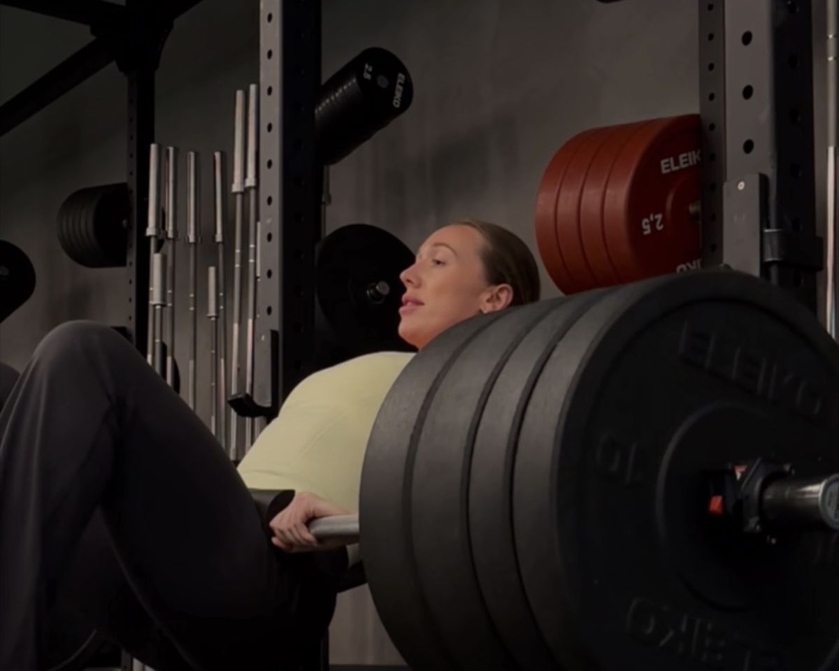 Chloe Antoniazzi doing a heavy barbell hip thrust